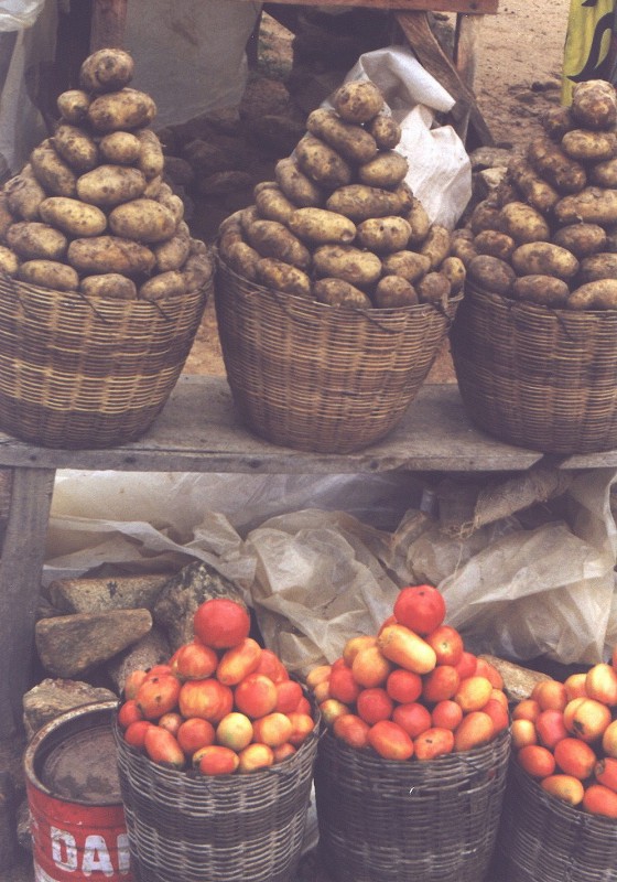 Potatoes and tomatoes for sale