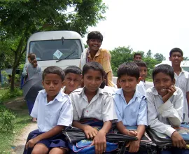 A group of boys on their way to or from school.