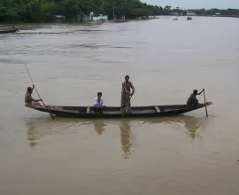 People travel along the riverways via small river boats.