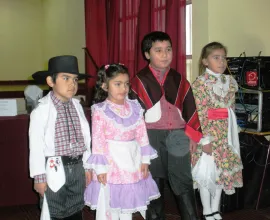 Children at the Escuela Lucila Godoy Alcayaga in Hualpén get ready to dance the Cueca, Chile’s traditional national dance.