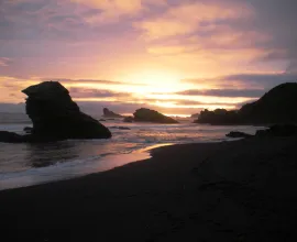 The Hualpén Peninsula is where the Bío Bío River flows into the Pacific Ocean, seen here at sunset.