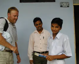 Iowa educator, George, with a student at Bhandrej School.