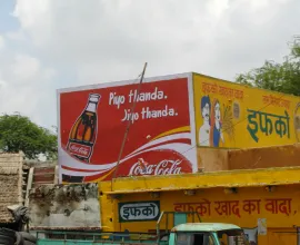 Coke is a popular drink in India and is commonly advertised.