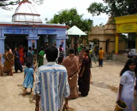 People gather at a temple in Dumka.