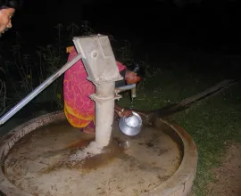 A water pump in Dumka where people go to get clean drinking water.