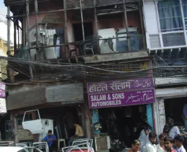 Shops on a busy Indian street.