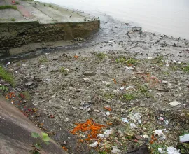 Pollution on the banks of a river in Kolkata.