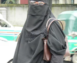 A fully-covered woman out in public.