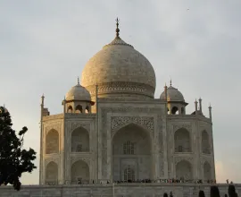 The sun sets on the Taj Mahal.