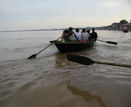 Rowboats traveling in Varanasi.