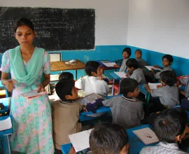 A teacher educates her students during class.