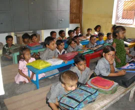 Young children in their classroom at school.