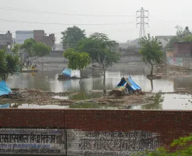 Tents amidst flooding.
