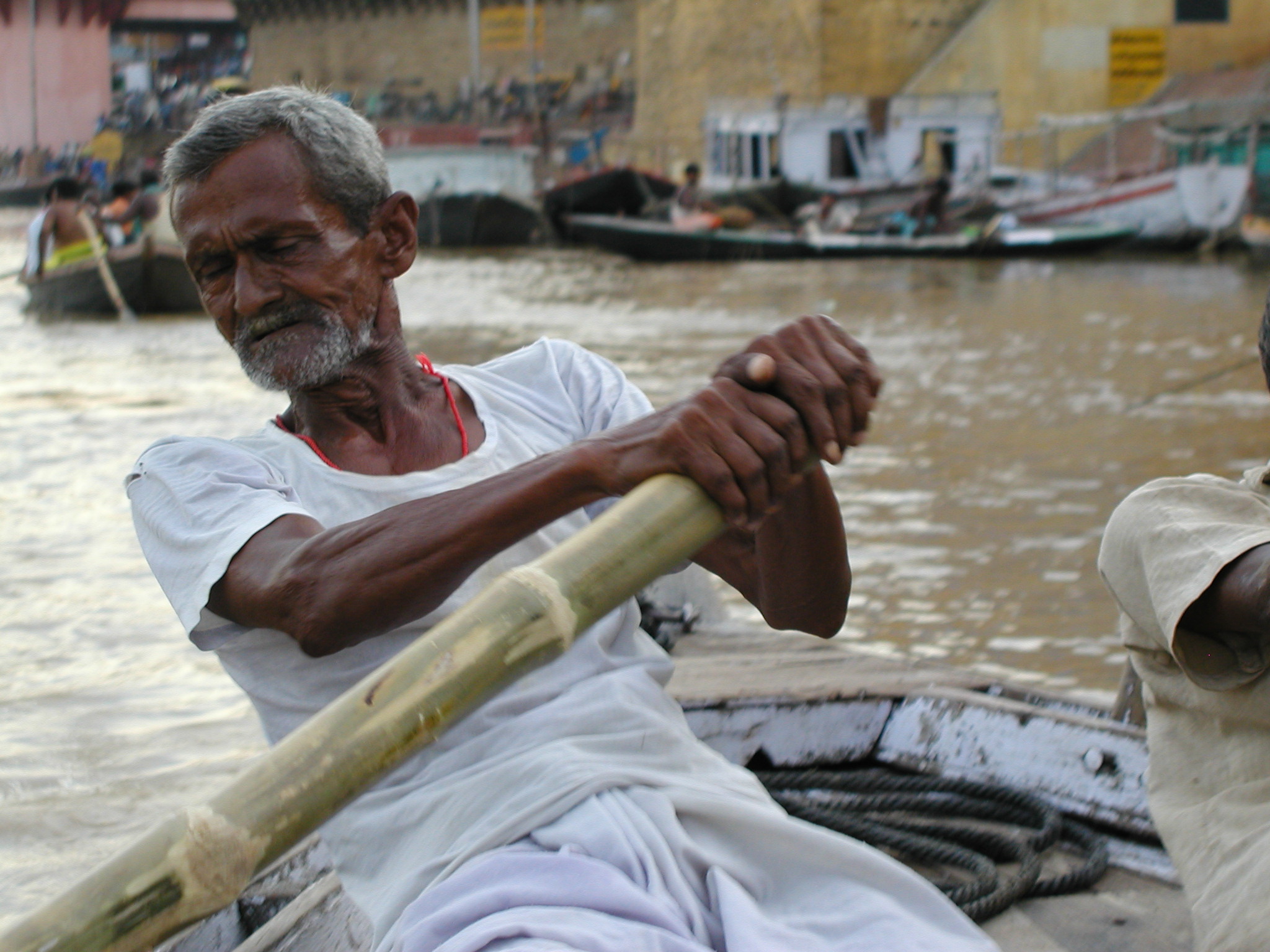 A man rowing his boat